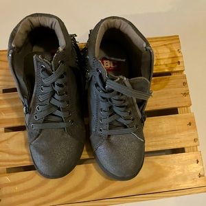 Gray wedge tenni shoes with leather like fringe and gemstones